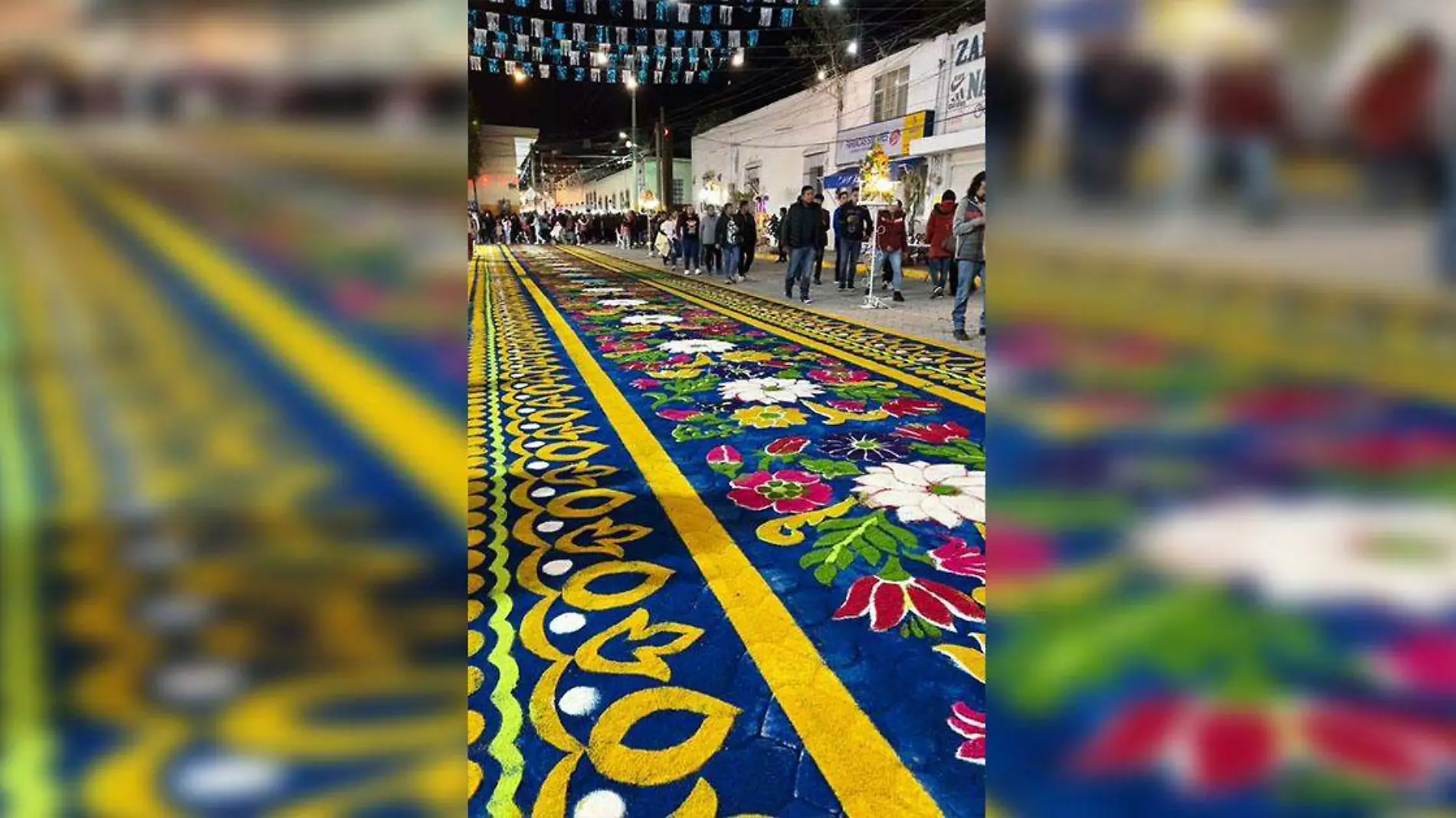 Alfombras de aserrín realizadas en su honor